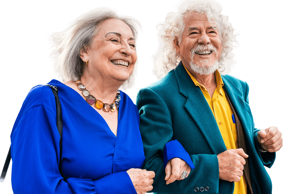 Well-Dressed Elderly Couple Walking Arm in Arm at Independent Living Facility Well-Dressed Elderly Couple Walking Arm in Arm at Independent Living Facility
