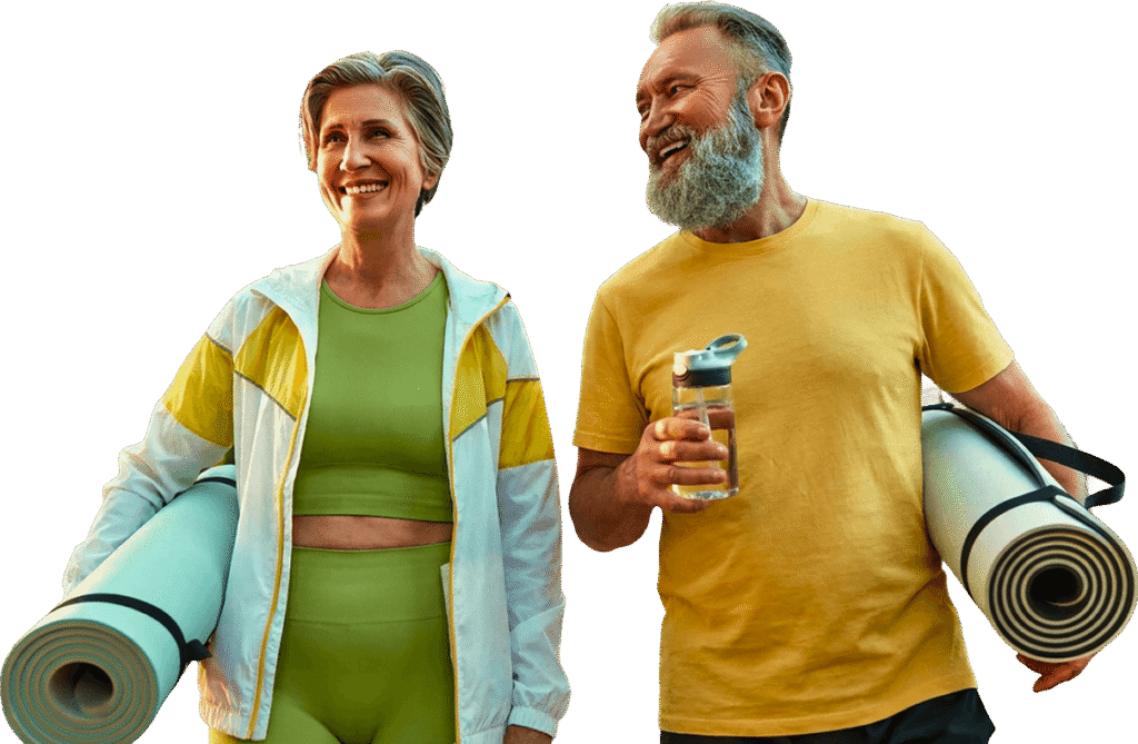 Active Elderly Couple Carrying Yoga Mats and Water Bottle at Independent Living Community