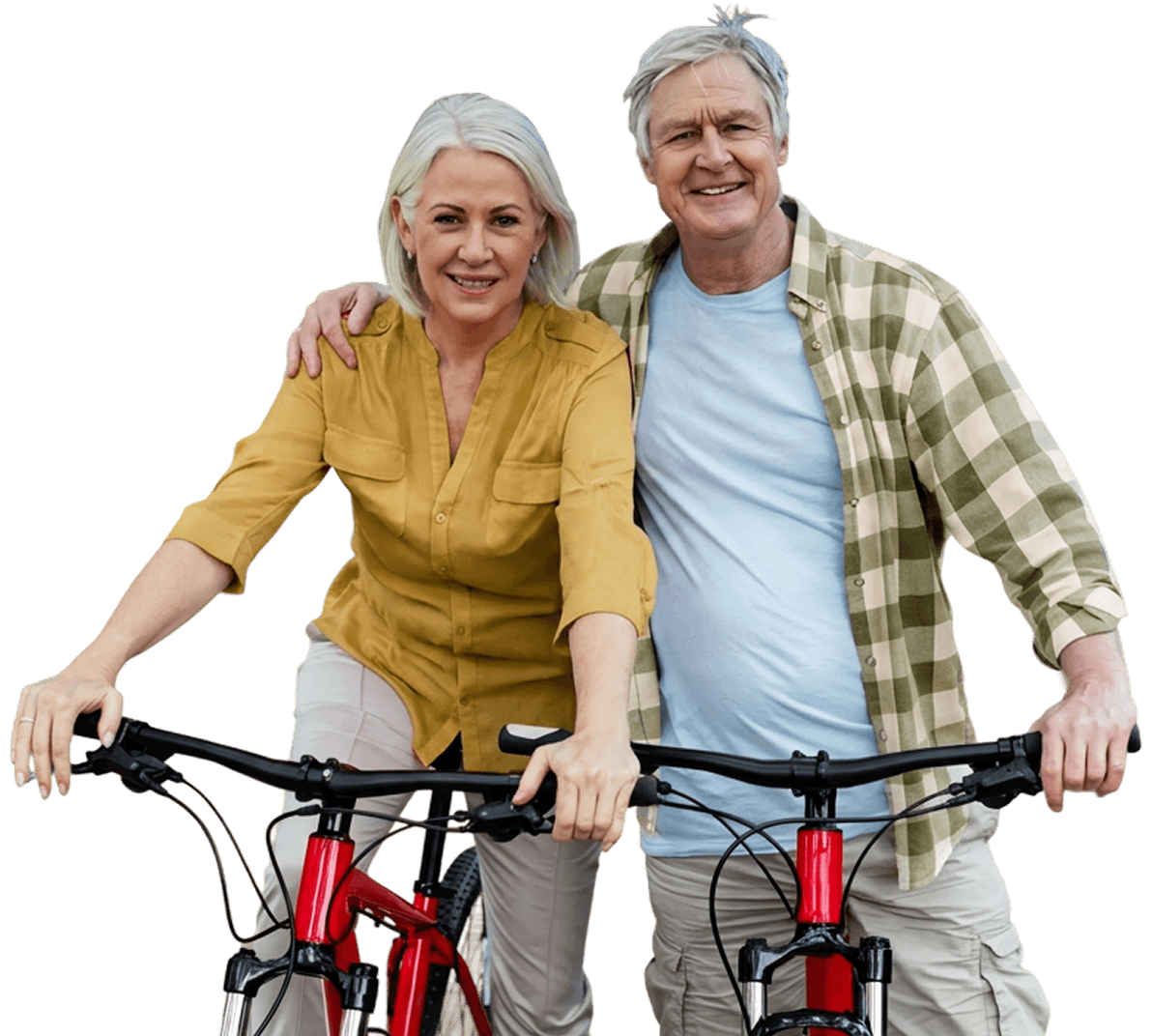 Smiling Elderly Couple Standing Together with Bicycles Outdoors at Independent Living Community Smiling Elderly Couple Standing Together with Bicycles Outdoors at Independent Living Community
